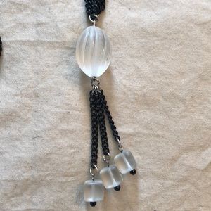 Black chain necklace with clear beads and tassel
